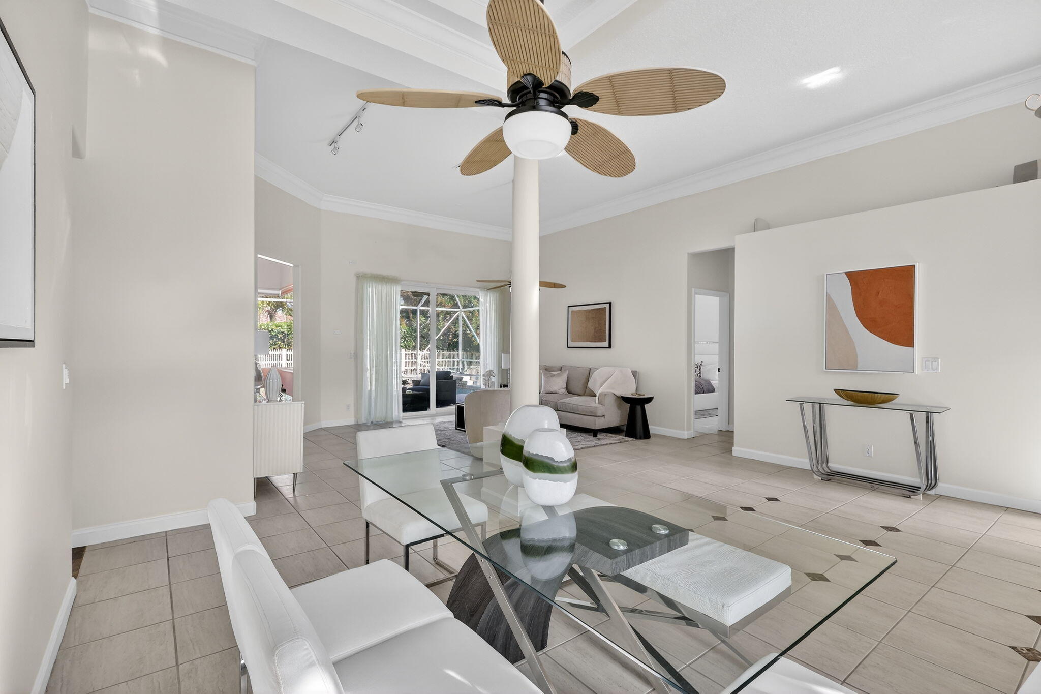 18981 Southeast Outrigger Lane Jupiter, FL 33458 - Photo 14 of 79 a living room with furniture and a chandelier