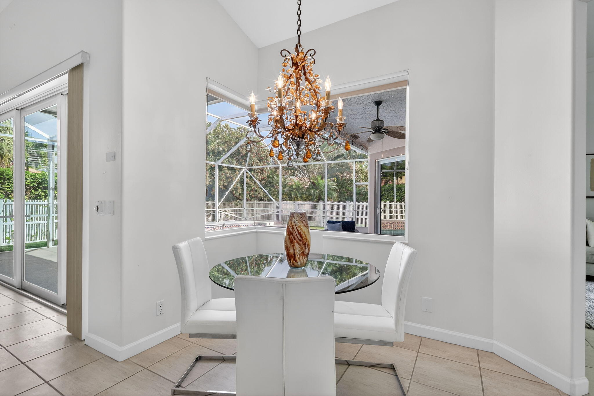 18981 Southeast Outrigger Lane Jupiter, FL 33458 - Photo 23 of 79 a view of a dining room with furniture window and outside view