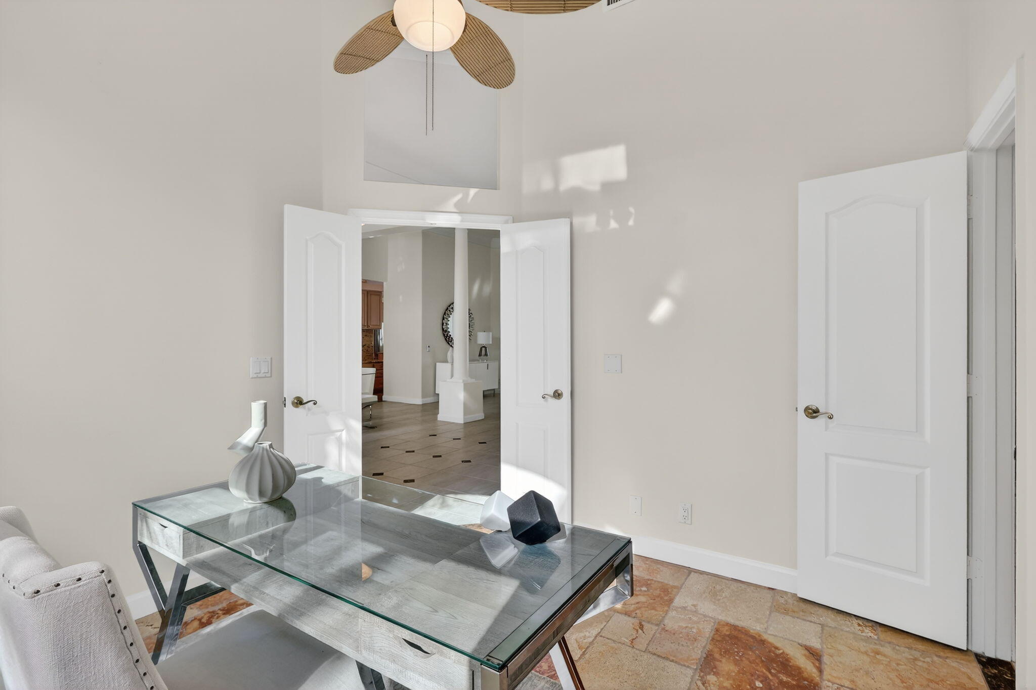 18981 Southeast Outrigger Lane Jupiter, FL 33458 - Photo 34 of 79 a view of a workspace with furniture and bathroom