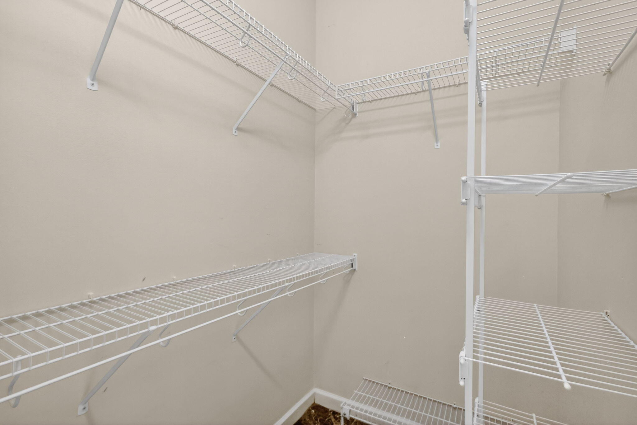 18981 Southeast Outrigger Lane Jupiter, FL 33458 - Photo 46 of 79 a view of a room with racks on the wall