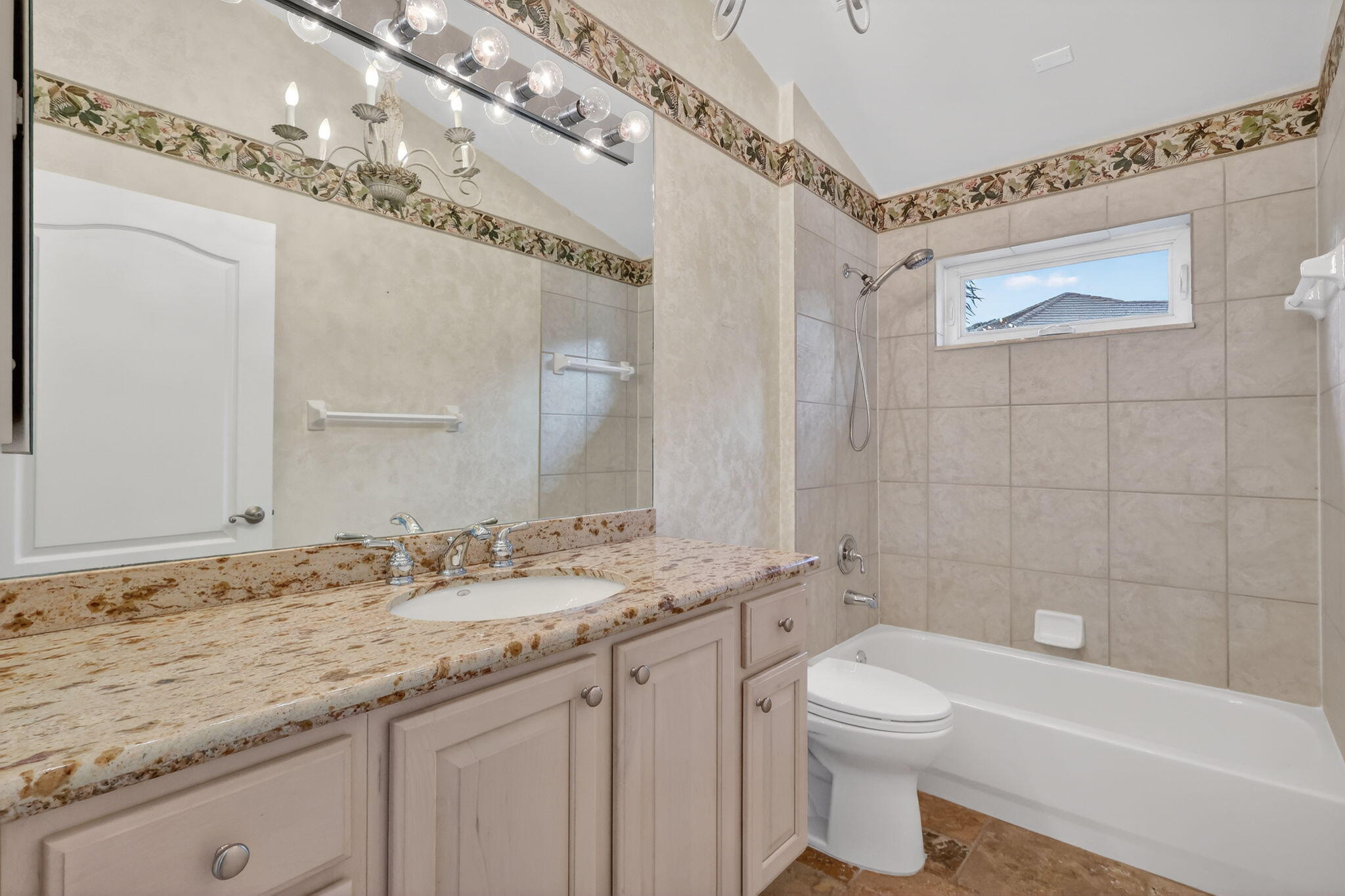 18981 Southeast Outrigger Lane Jupiter, FL 33458 - Photo 52 of 79 a bathroom with a granite countertop sink a toilet and bathtub
