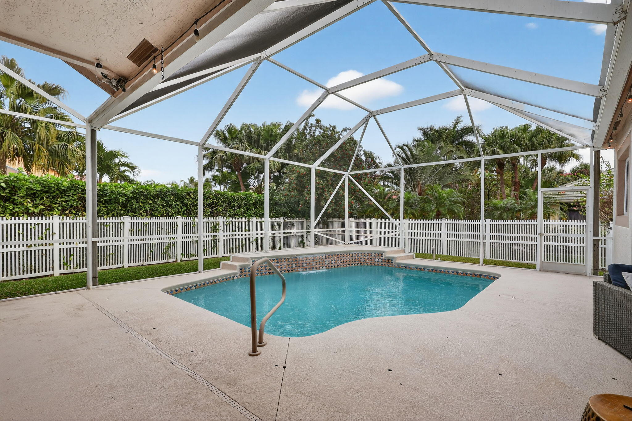 18981 Southeast Outrigger Lane Jupiter, FL 33458 - Photo 61 of 79 a view of a backyard with swimming pool