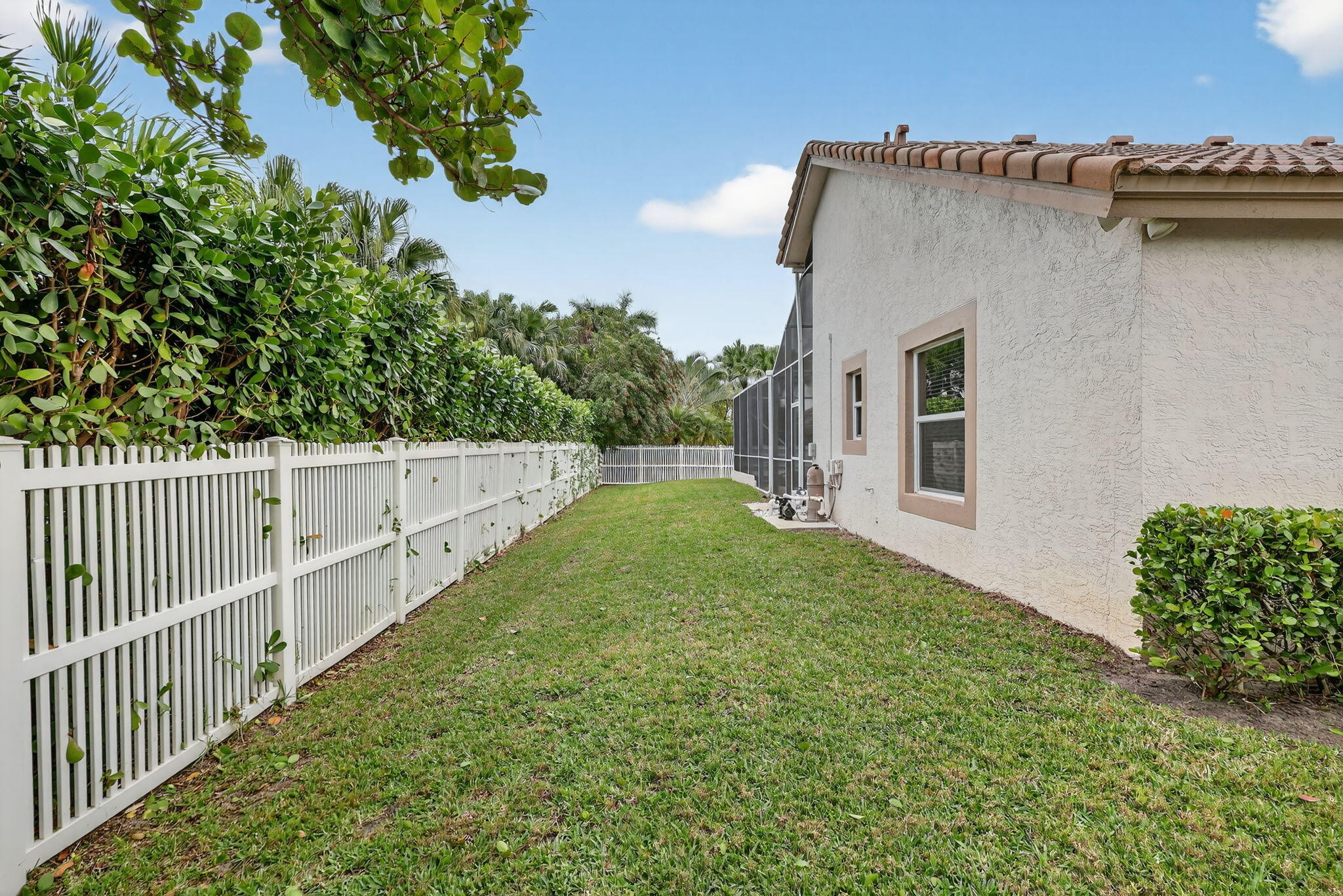 18981 Southeast Outrigger Lane Jupiter, FL 33458 - Photo 68 of 79 a view of a house with backyard