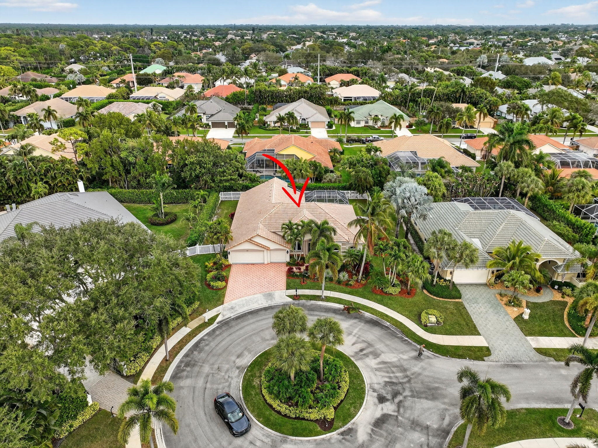 18981 Southeast Outrigger Lane Jupiter, FL 33458 - Photo 74 of 79 an aerial view of a house with a yard and lake view