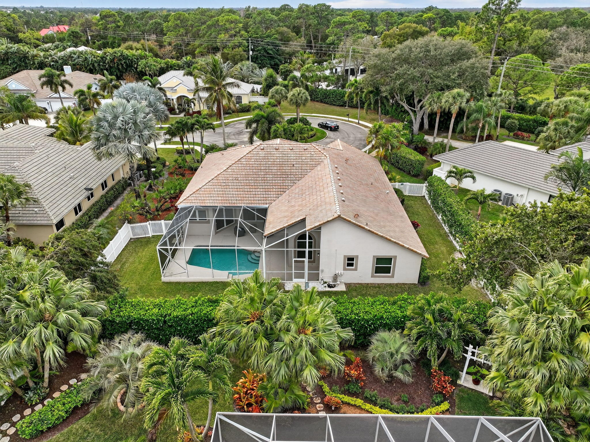 18981 Southeast Outrigger Lane Jupiter, FL 33458 - Photo 77 of 79 an aerial view of a house with a garden