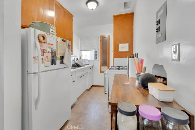 a bathroom with a sink toilet and mirror