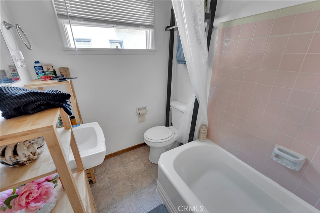 32 North 1st Street, Unit A Alhambra, CA 91801 - Photo 5 of 6 a bathroom with a sink and a toilet