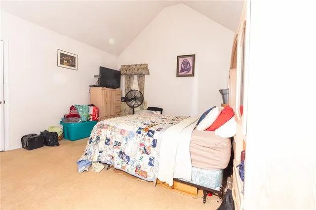 a hallway with a storage and utility