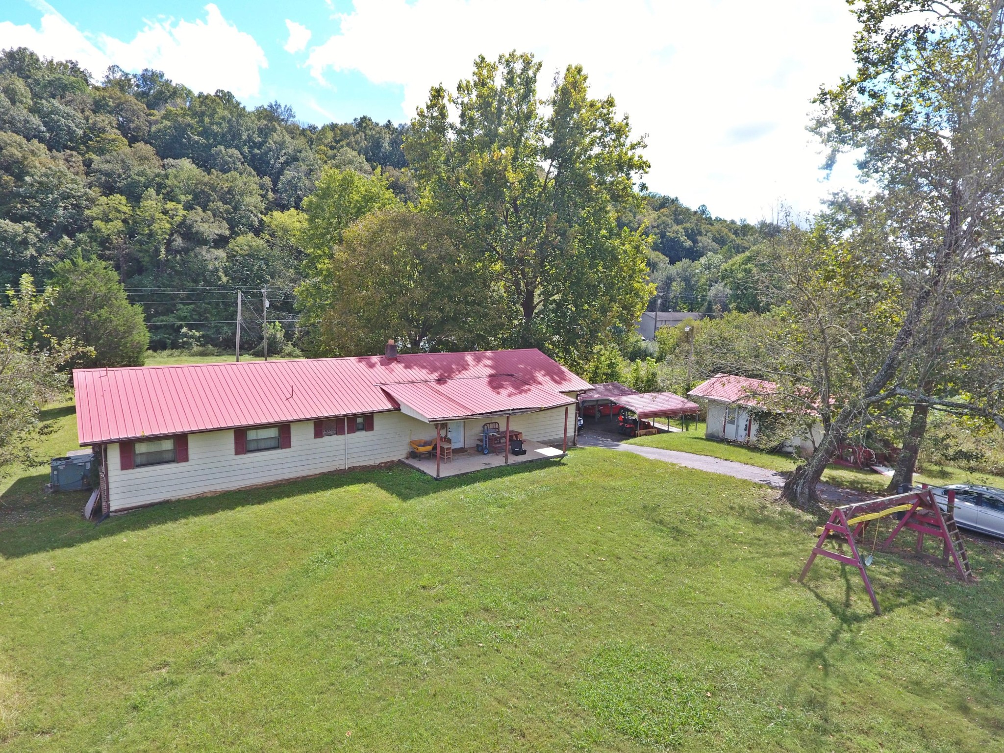 864 East Wolf Valley Road Heiskell, TN 37754 - Photo 4 of 17 an outdoor space with furniture and garden
