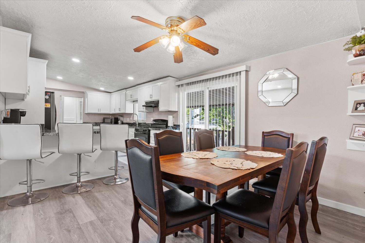 159 Village Circle Sacramento, CA 95838 - Photo 12 of 38 a view of a dining room with furniture window and wooden floor