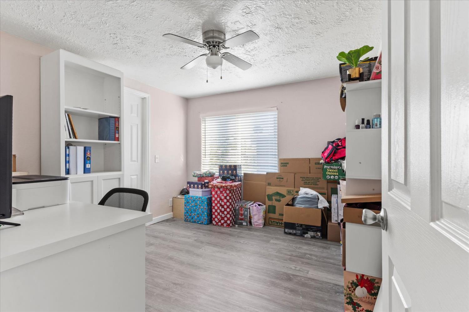 159 Village Circle Sacramento, CA 95838 - Photo 25 of 38 a view of a workspace with furniture and a window