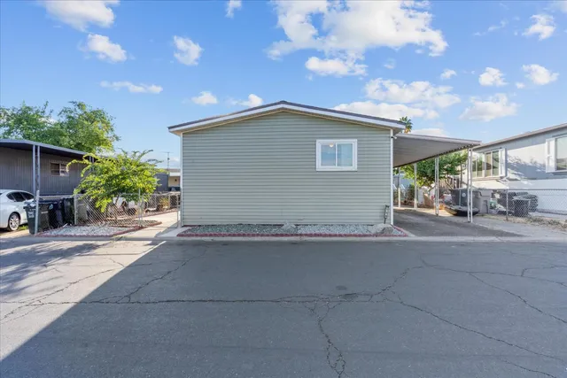 a view of street along with trees