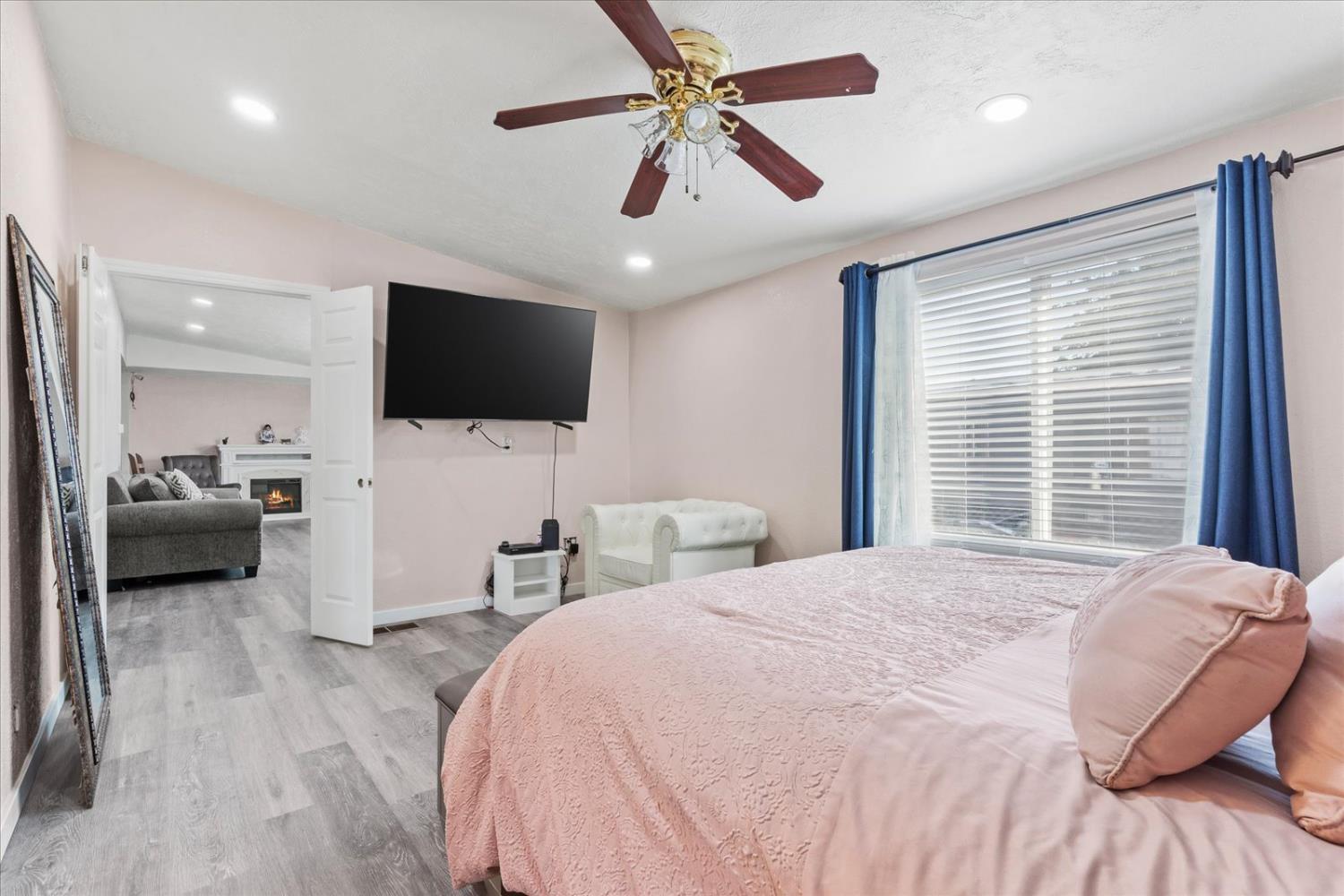 159 Village Circle Sacramento, CA 95838 - Photo 34 of 38 a bedroom with a bed window and a flat screen tv