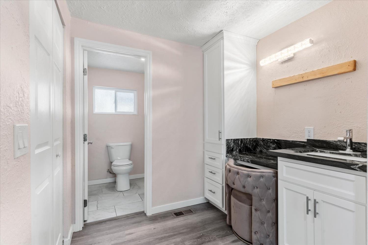 159 Village Circle Sacramento, CA 95838 - Photo 35 of 38 a kitchen with a stove and a sink
