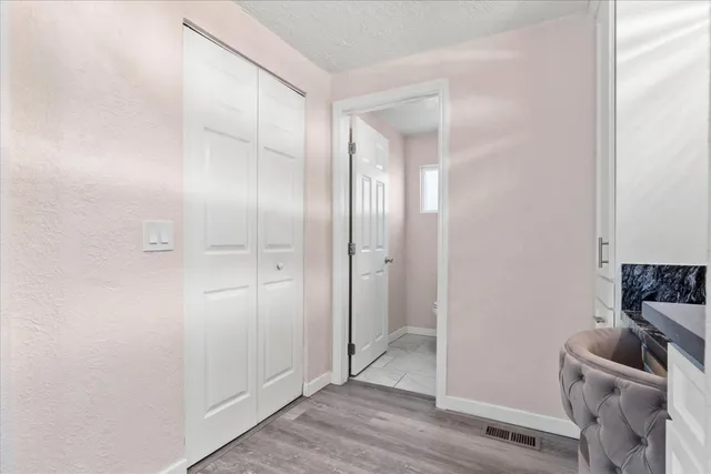 a bathroom with a shower and a mirror