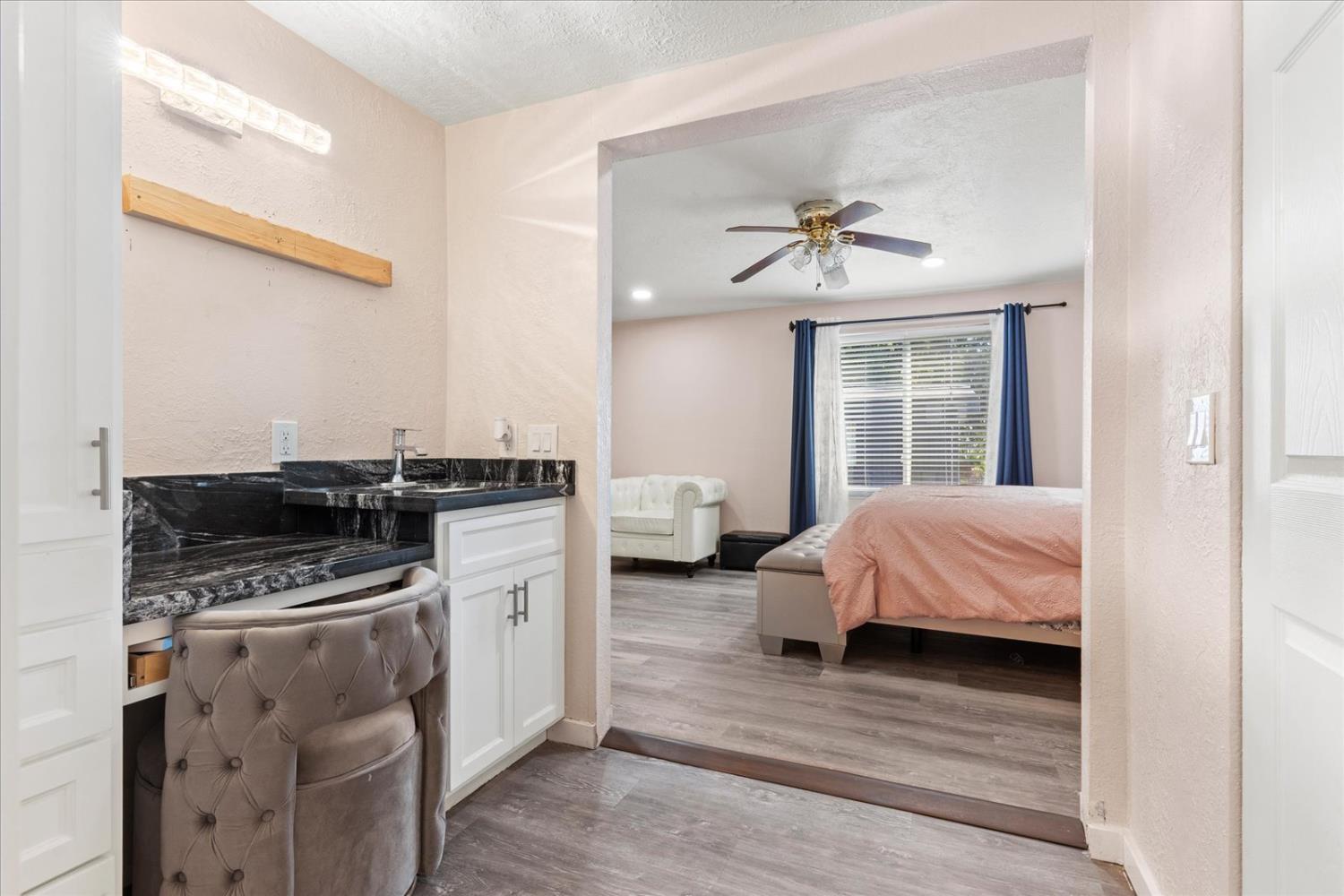 159 Village Circle Sacramento, CA 95838 - Photo 38 of 38 a kitchen with a stove cabinets and wooden floor