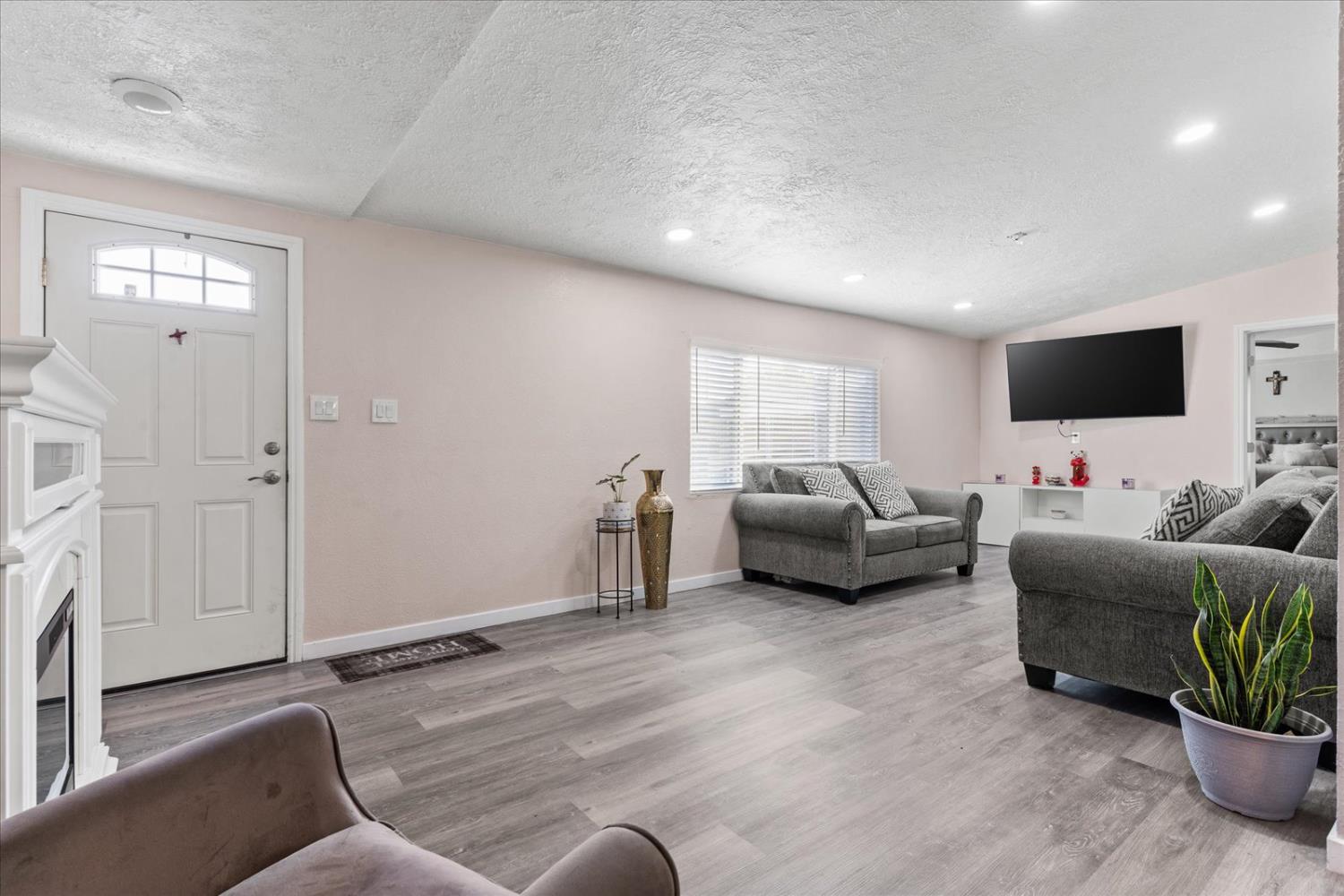 159 Village Circle Sacramento, CA 95838 - Photo 7 of 38 a living room with furniture and a flat screen tv