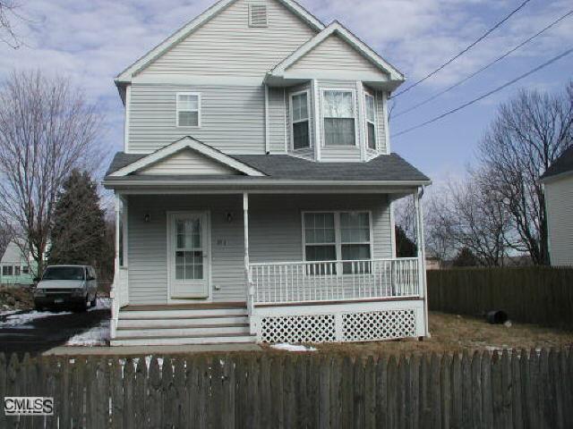 252 Sylvan Street Bridgeport, CT 06606 - Photo 1 of 1 a front view of a house with a garden