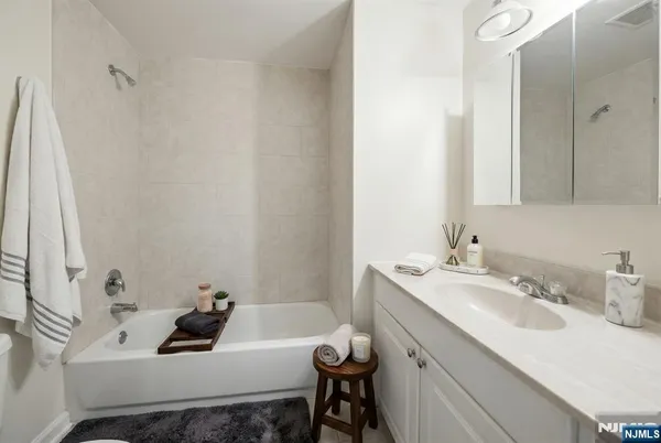 a bathroom with a sink and a toilet