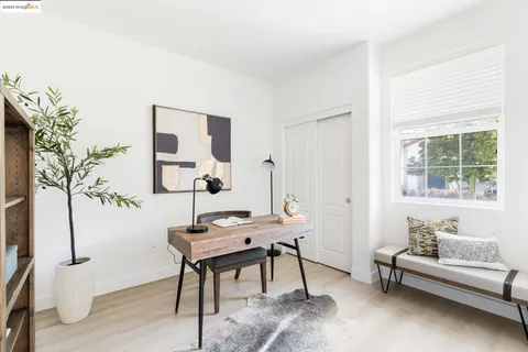 a view of a livingroom with furniture and window