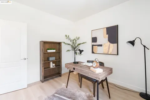 a view of a workspace with furniture