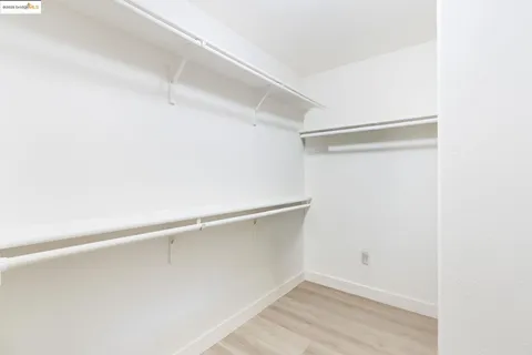 a bathroom with a sink vanity and a mirror