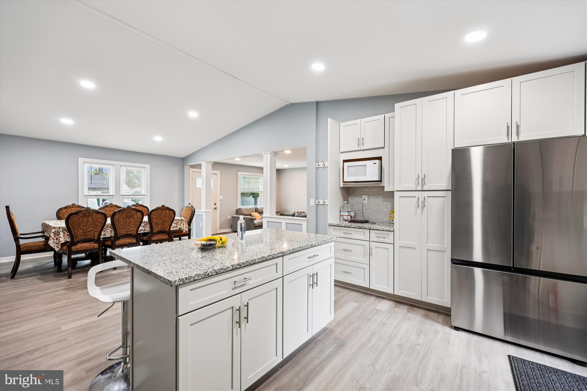 8313 Shady Spring Drive Gaithersburg, MD 20877 - Photo 1 of 30 a kitchen with white cabinets and stainless steel appliances