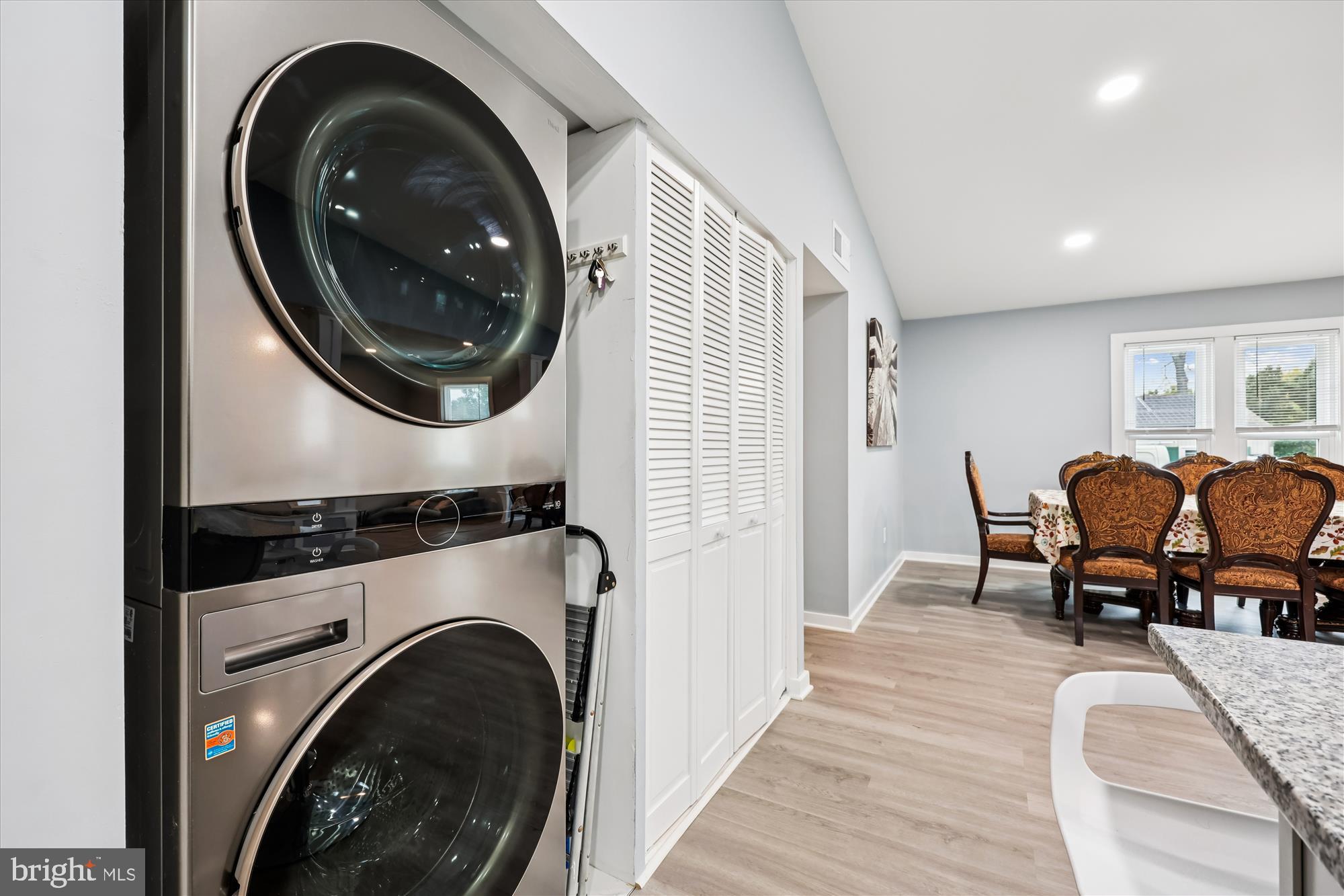 8313 Shady Spring Drive Gaithersburg, MD 20877 - Photo 11 of 30 a view of livingroom with washer and dryer