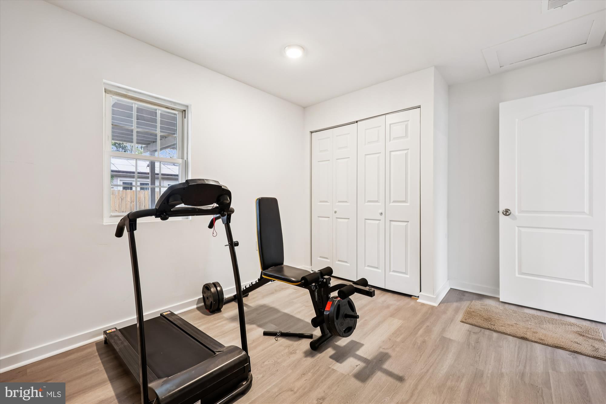 8313 Shady Spring Drive Gaithersburg, MD 20877 - Photo 20 of 30 a view of a room with gym equipment