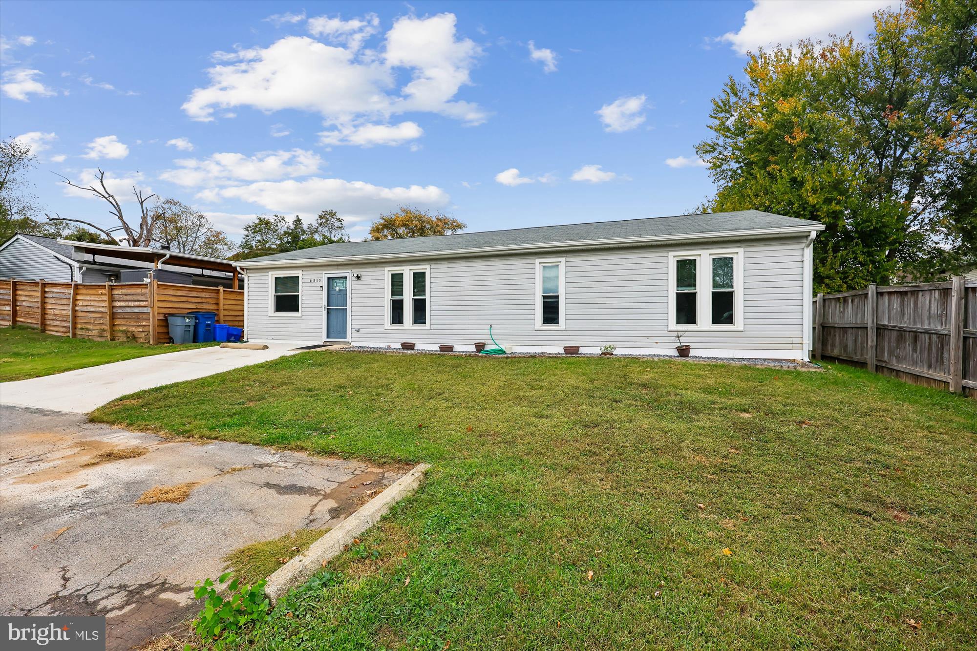 8313 Shady Spring Drive Gaithersburg, MD 20877 - Photo 23 of 30 a front view of house with yard and green space