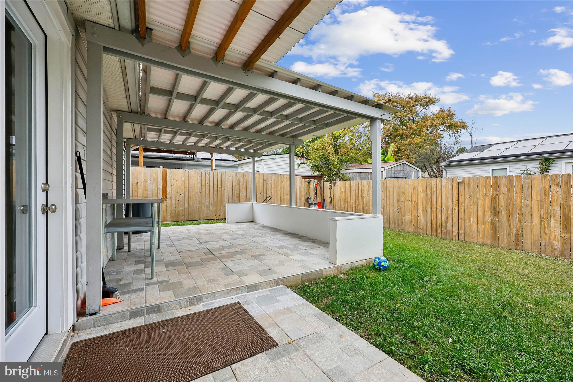 8313 Shady Spring Drive Gaithersburg, MD 20877 - Photo 29 of 30 a view of a backyard with wooden fence