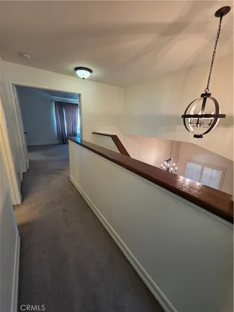 a bathroom with a double vanity sink and mirror