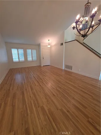 a view of a livingroom with a hard wood floor