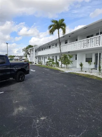 a car parked in front of a building