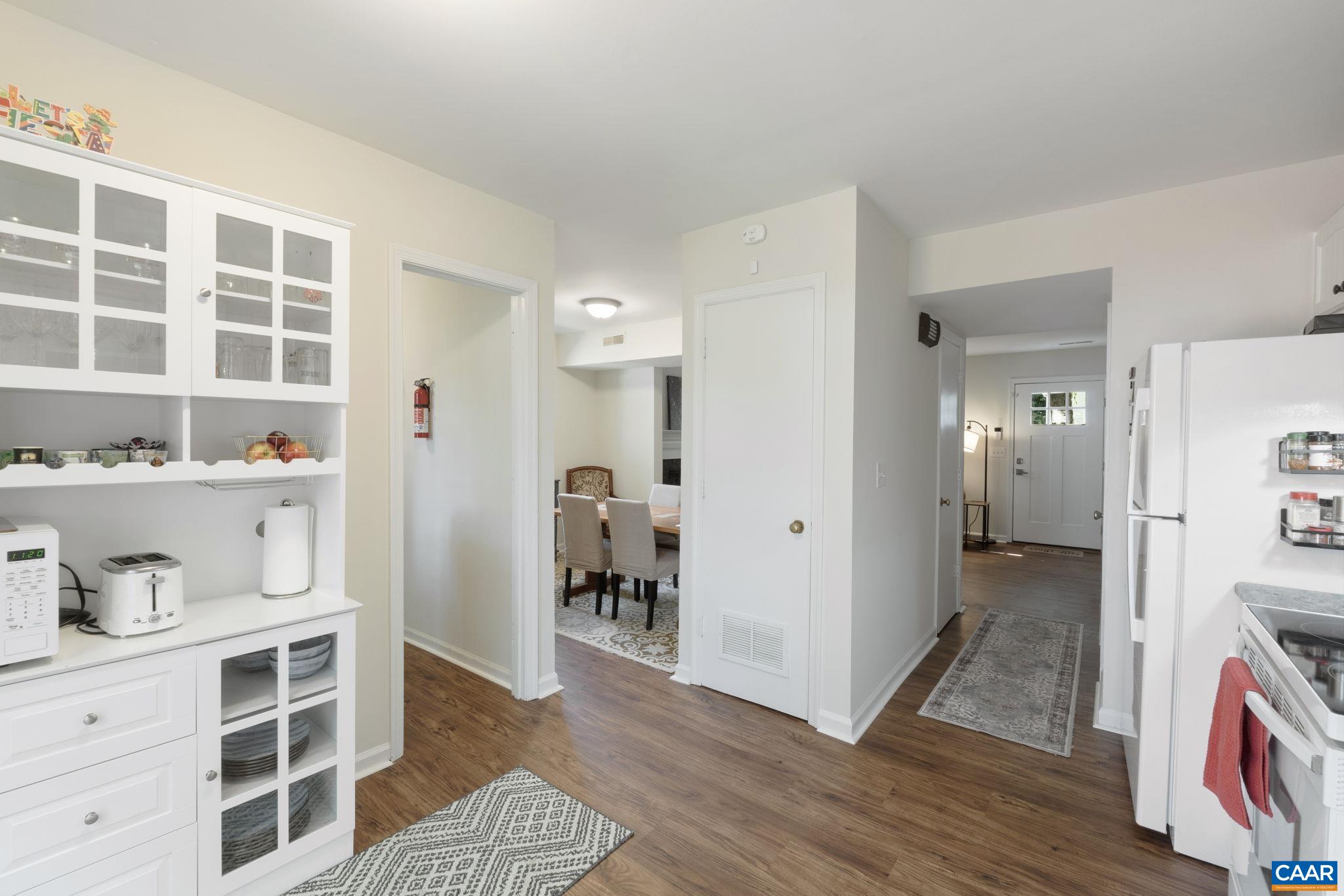 705 Prospect Avenue Charlottesville, VA 22903 - Photo 14 of 38 a view of livingroom with kitchen and wooden floor