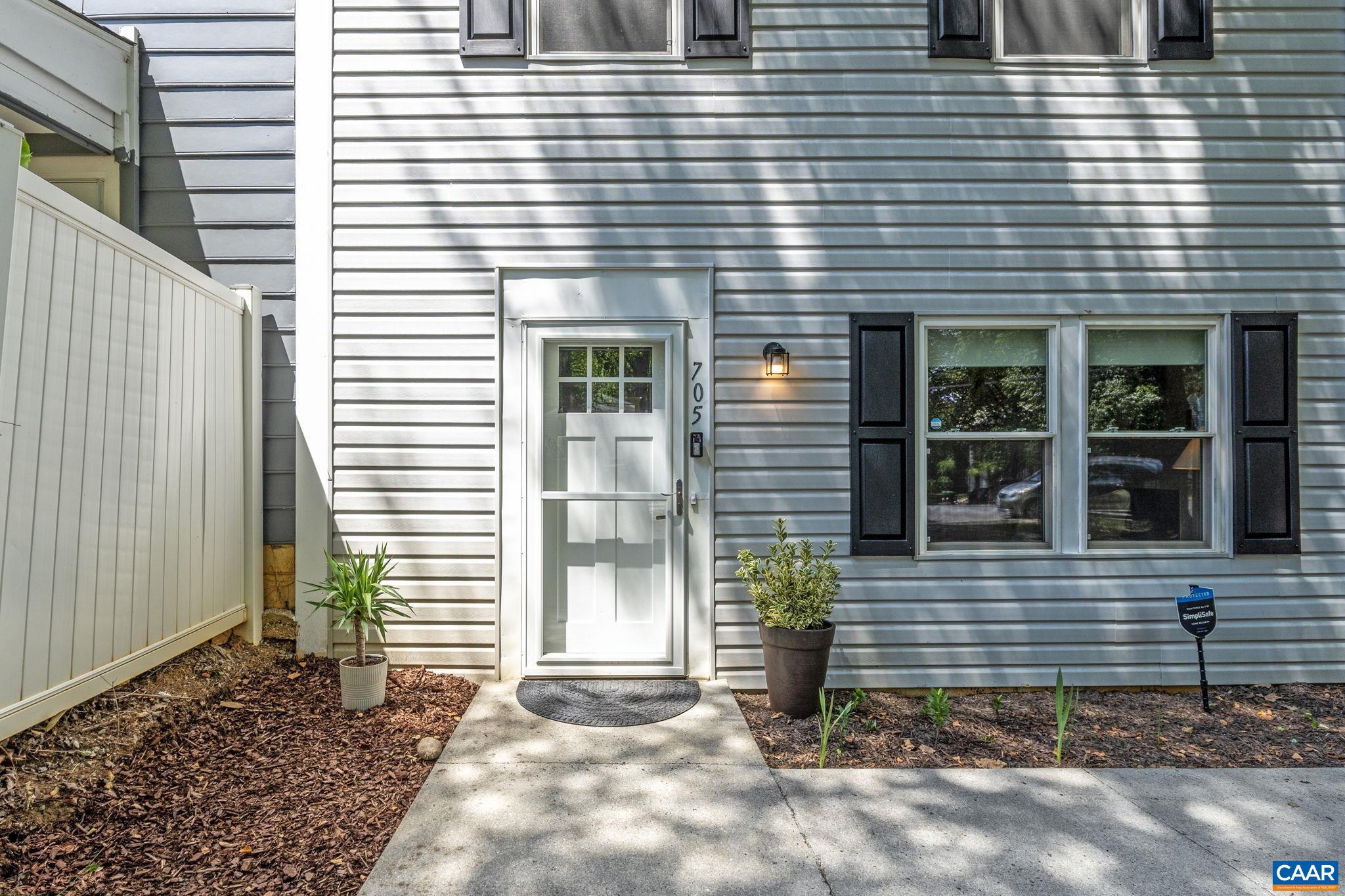 705 Prospect Avenue Charlottesville, VA 22903 - Photo 2 of 38 a view of a house with a yard and large window