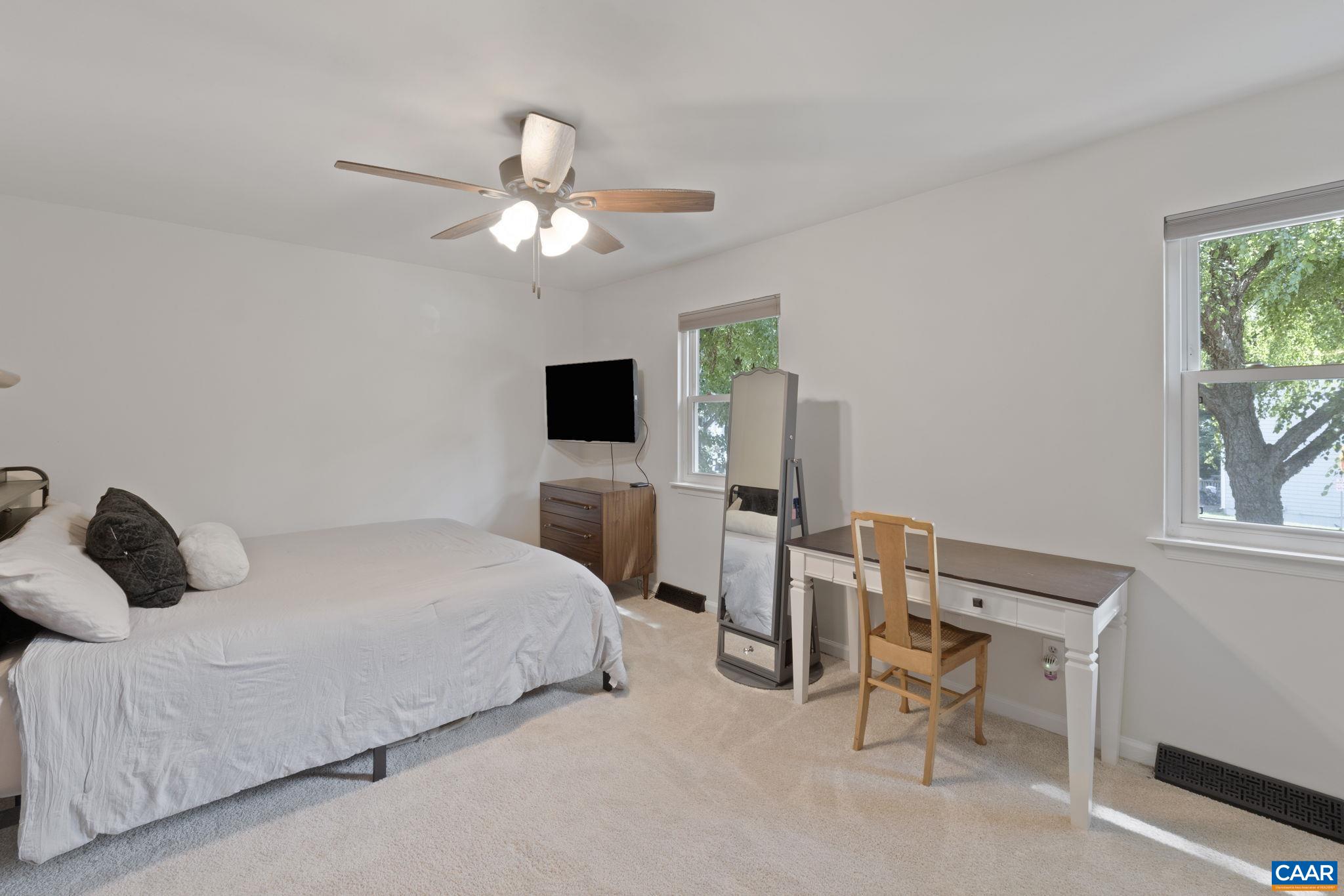 705 Prospect Avenue Charlottesville, VA 22903 - Photo 23 of 38 a bedroom with a bed and a window