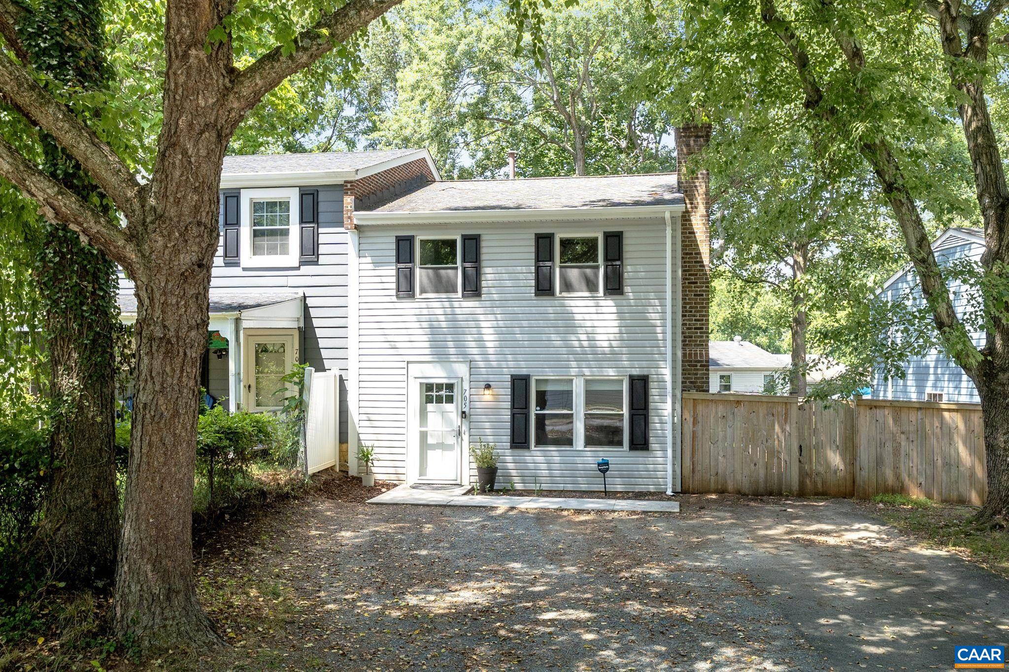 705 Prospect Avenue Charlottesville, VA 22903 - Photo 35 of 38 a front view of a house with a yard and garage