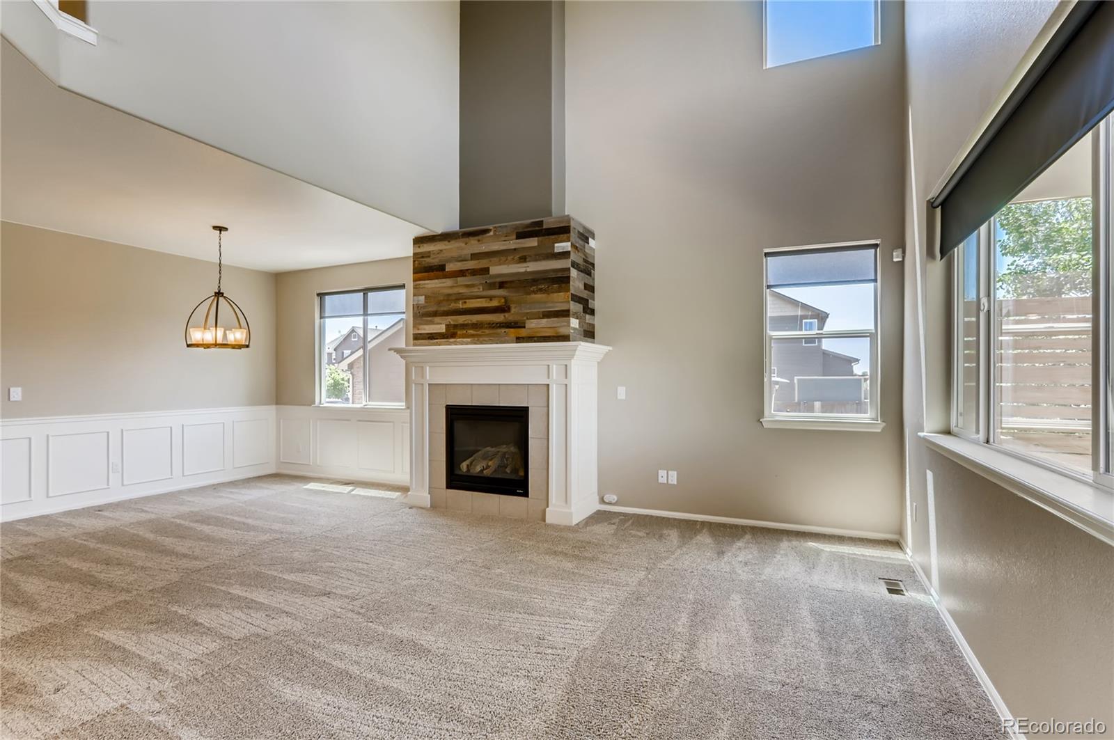 8627 Raspberry Drive Frederick, CO 80504 - Photo 13 of 33 a view of livingroom with fireplace