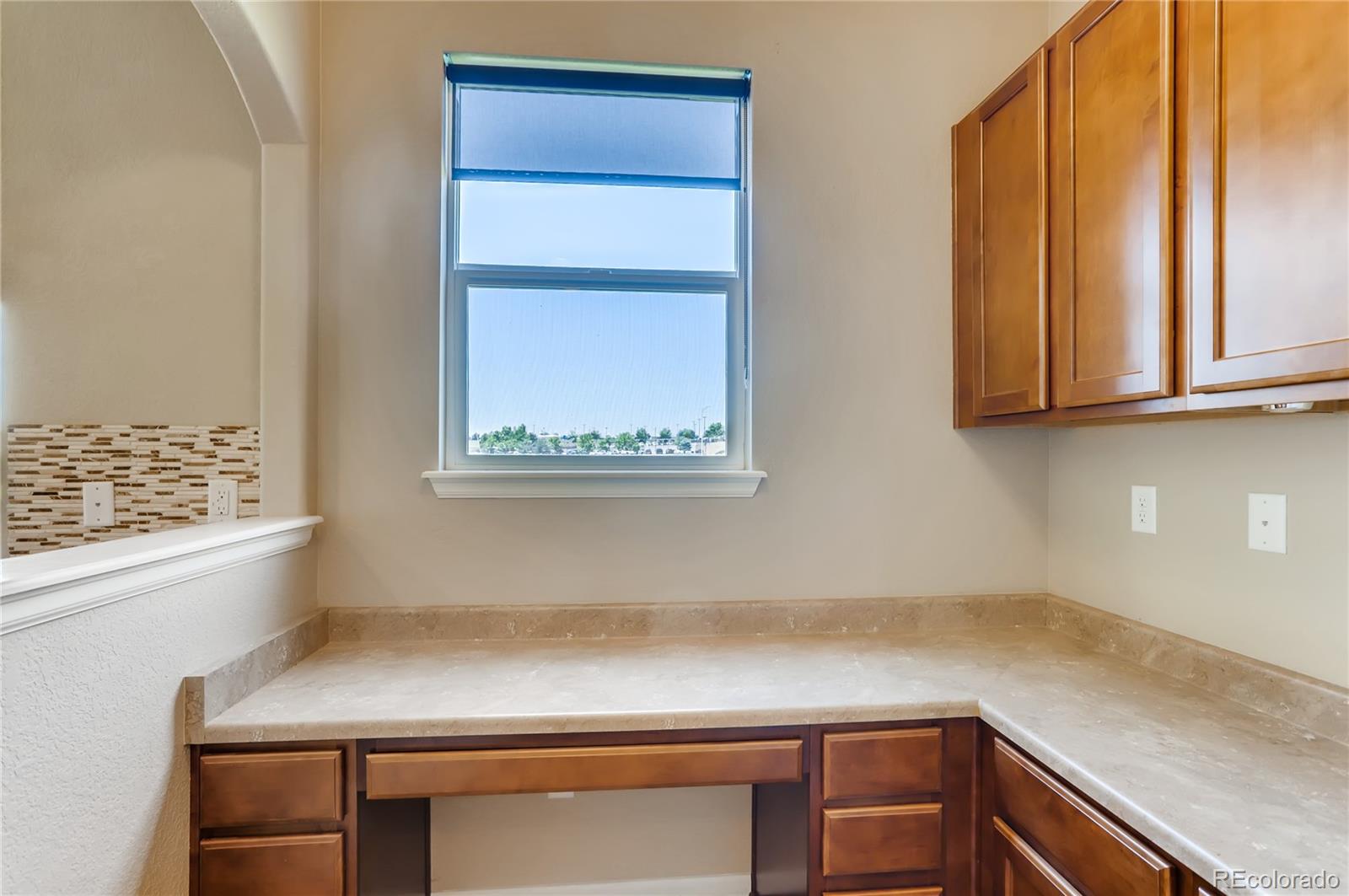 8627 Raspberry Drive Frederick, CO 80504 - Photo 15 of 33 a utility room with a sink
