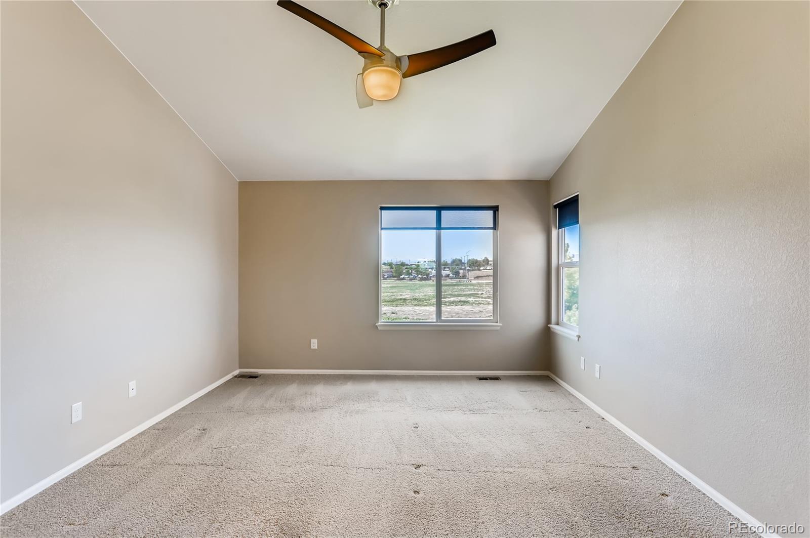 8627 Raspberry Drive Frederick, CO 80504 - Photo 18 of 33 an empty room with a window