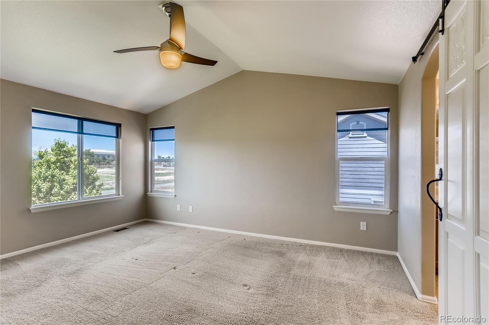 8627 Raspberry Drive Frederick, CO 80504 - Photo 19 of 33 a view of an empty room with a window