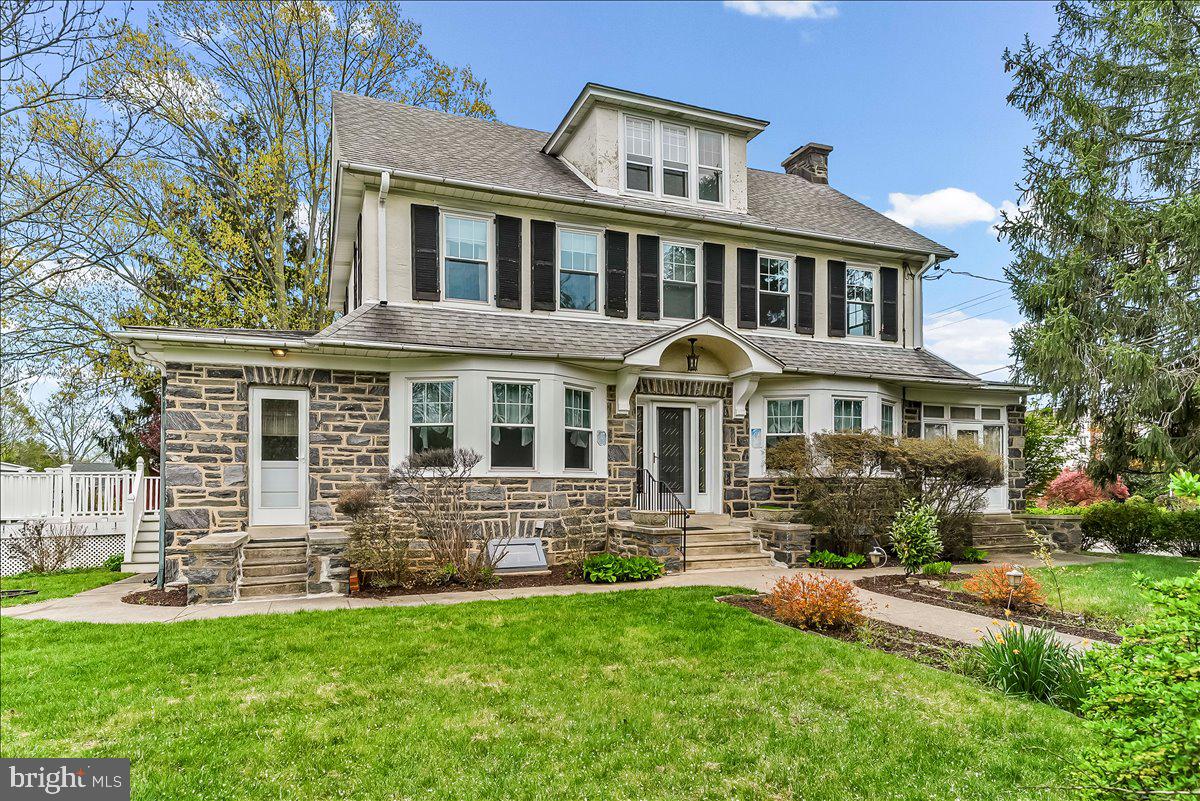 216 East Manoa Road Havertown, PA 19083 - Photo 2 of 37 a front view of a house with a yard