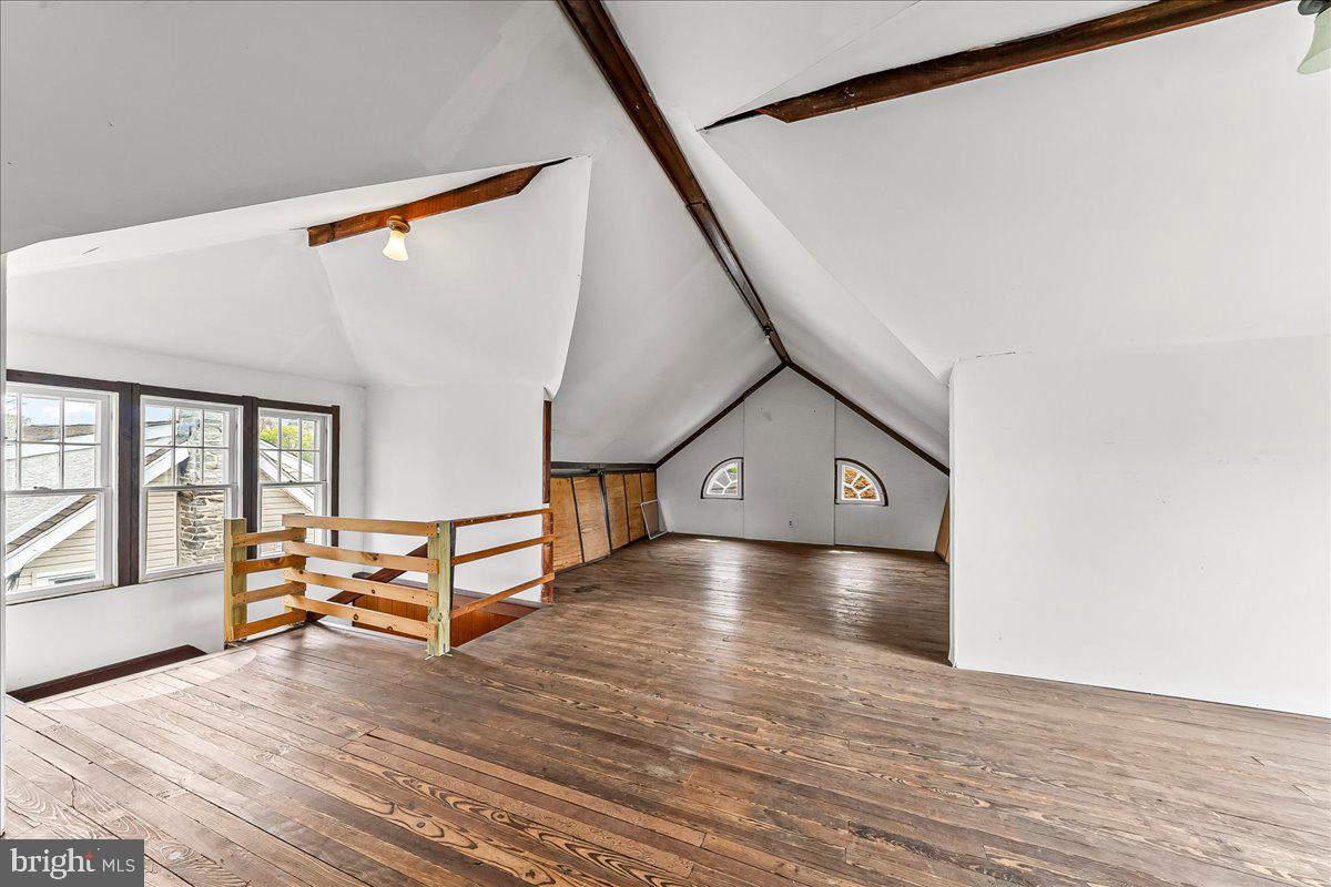 216 East Manoa Road Havertown, PA 19083 - Photo 25 of 37 a view of a hallway with wooden floor and staircase