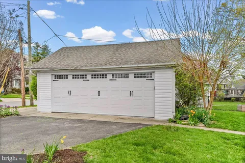 an aerial view of a house with a garden