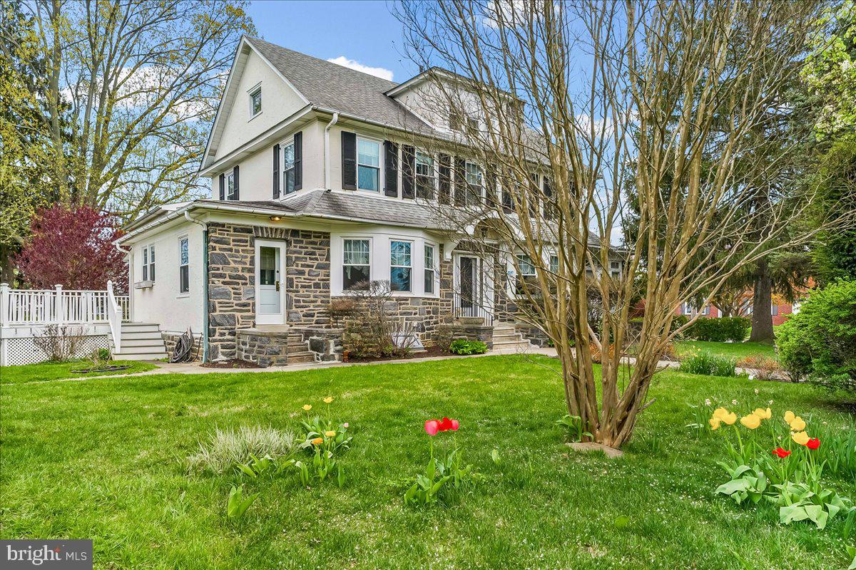 216 East Manoa Road Havertown, PA 19083 - Photo 3 of 37 a front view of a house with a yard and trees