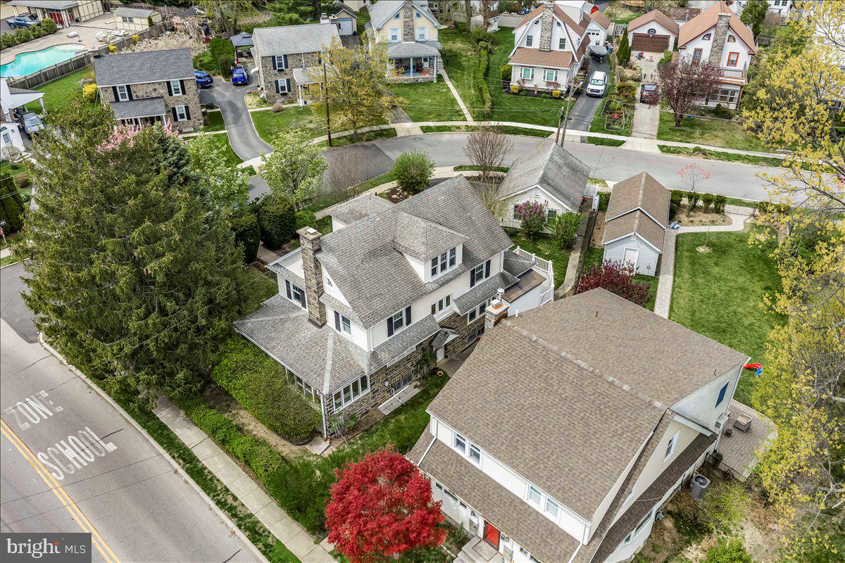 216 East Manoa Road Havertown, PA 19083 - Photo 31 of 37 an aerial view of multiple houses with yard