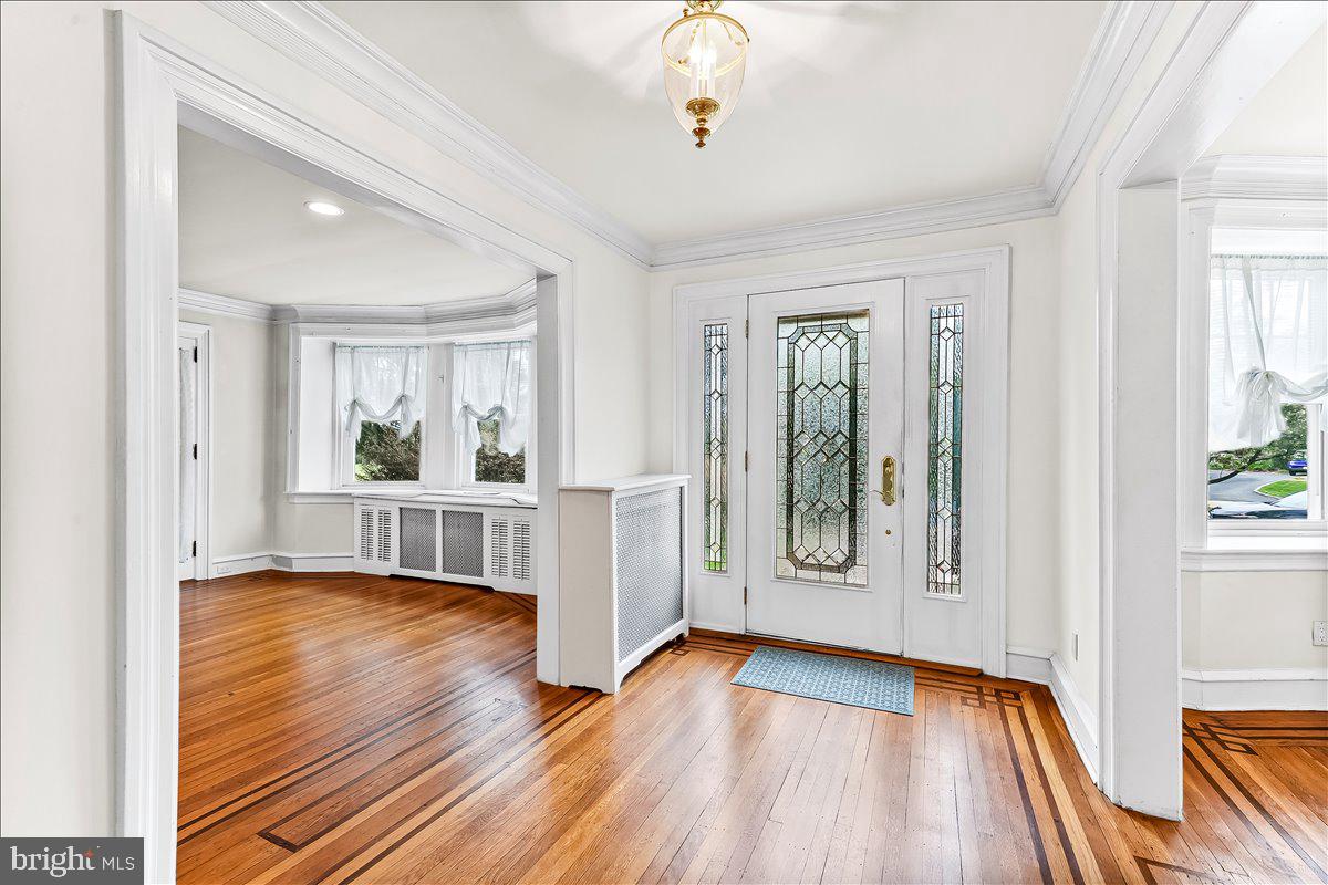 216 East Manoa Road Havertown, PA 19083 - Photo 5 of 37 wooden floor in an empty room with a window