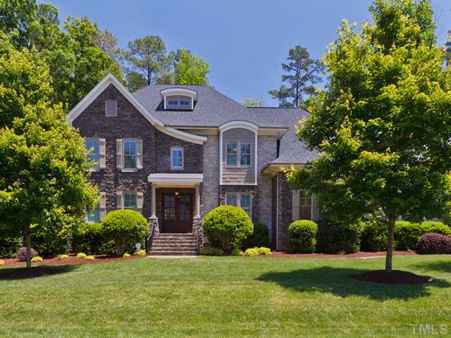 11300 Moonsprite Way Raleigh, NC 27614 - Photo 1 of 25 a front view of a house with a yard and garage