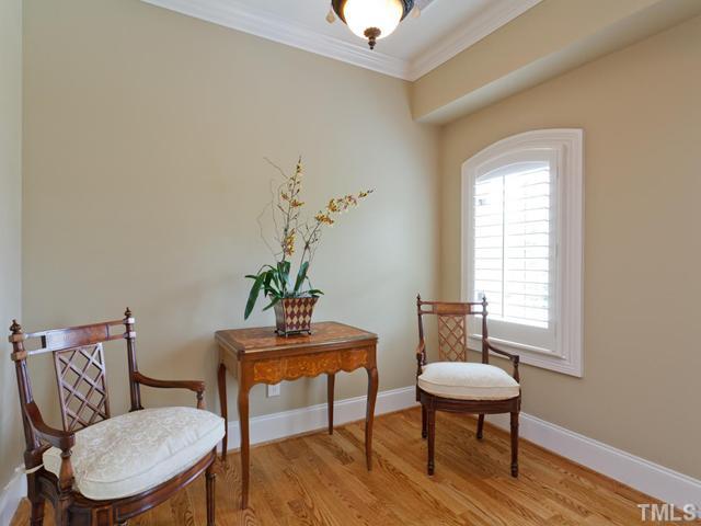 11300 Moonsprite Way Raleigh, NC 27614 - Photo 14 of 25 a workspace with furniture and wooden floor